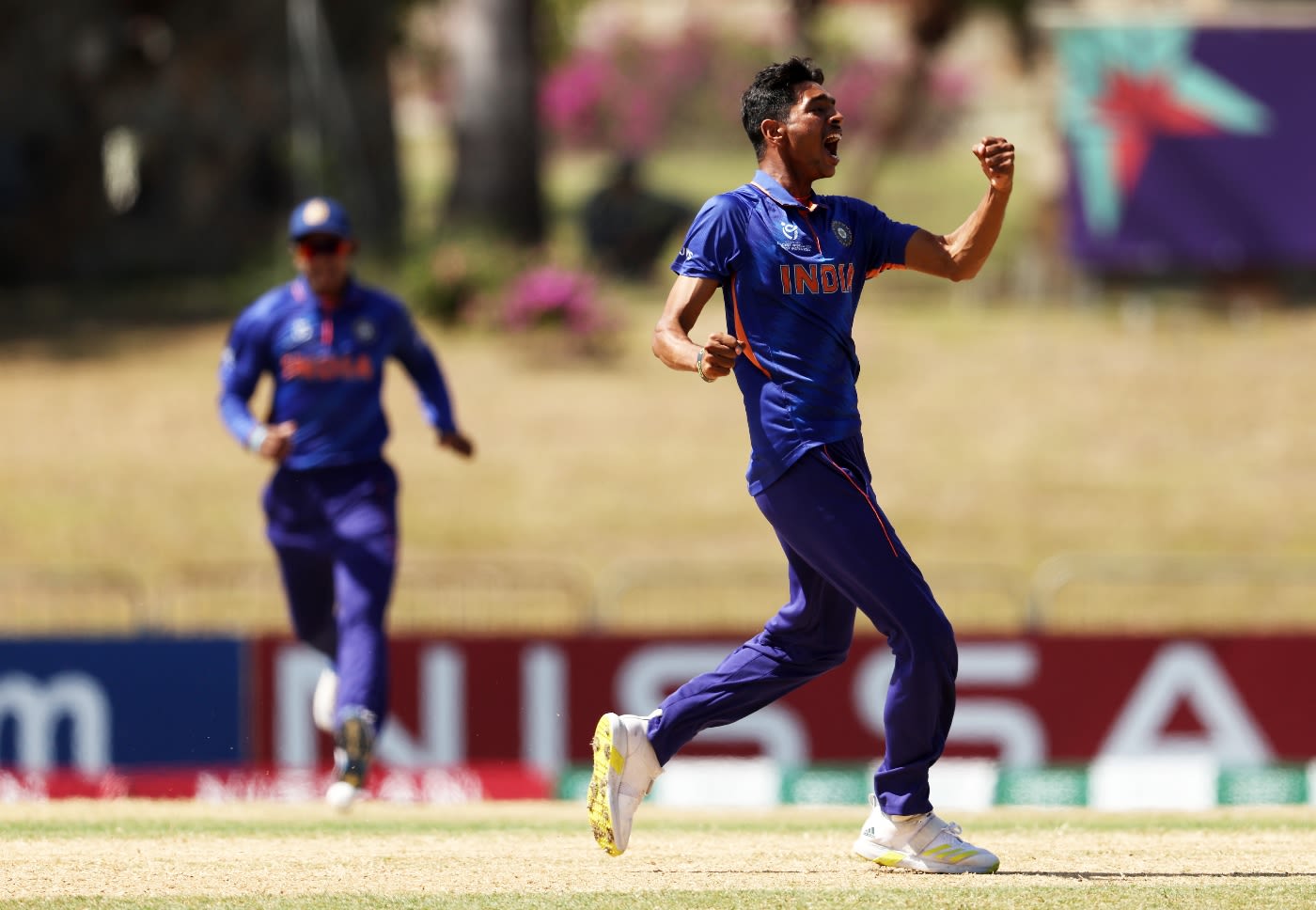 Ravi Kumar celebrates dismissing Teague Wyllie