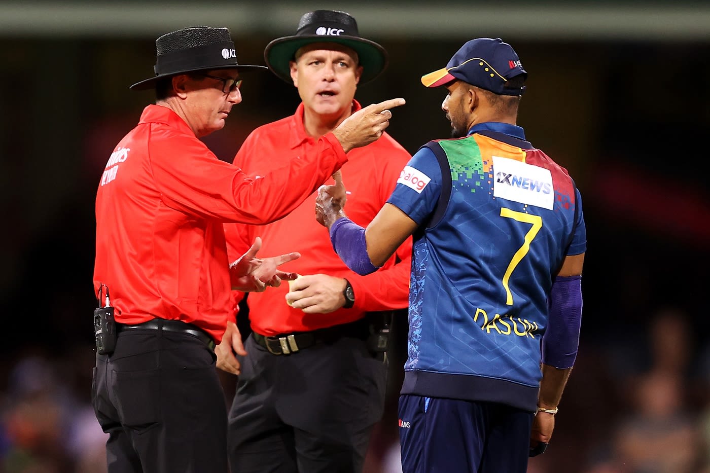 The umpires inform Dasun Shanaka that his team has been penalised for slow over-rate