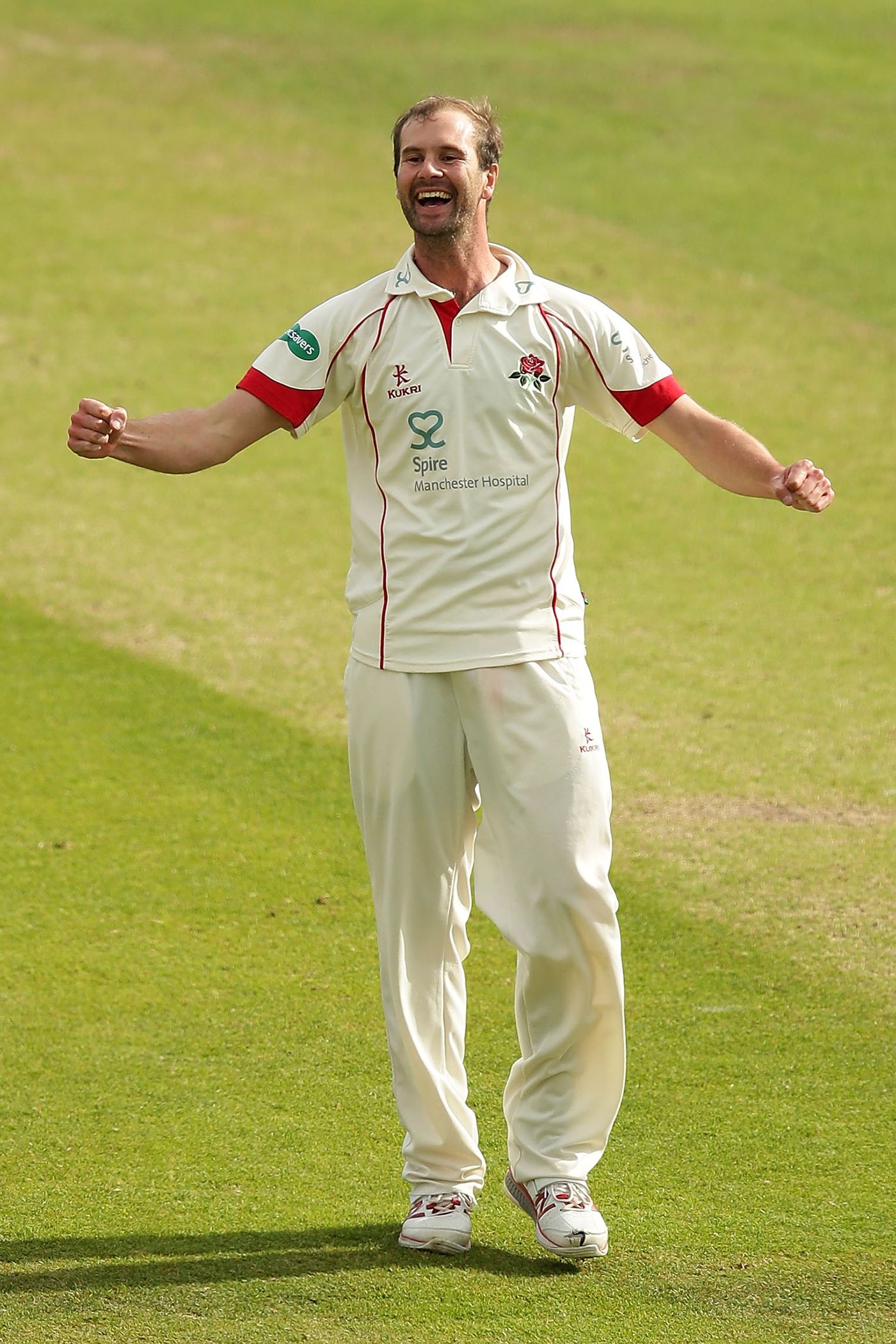 Tom Smith celebrates a wicket