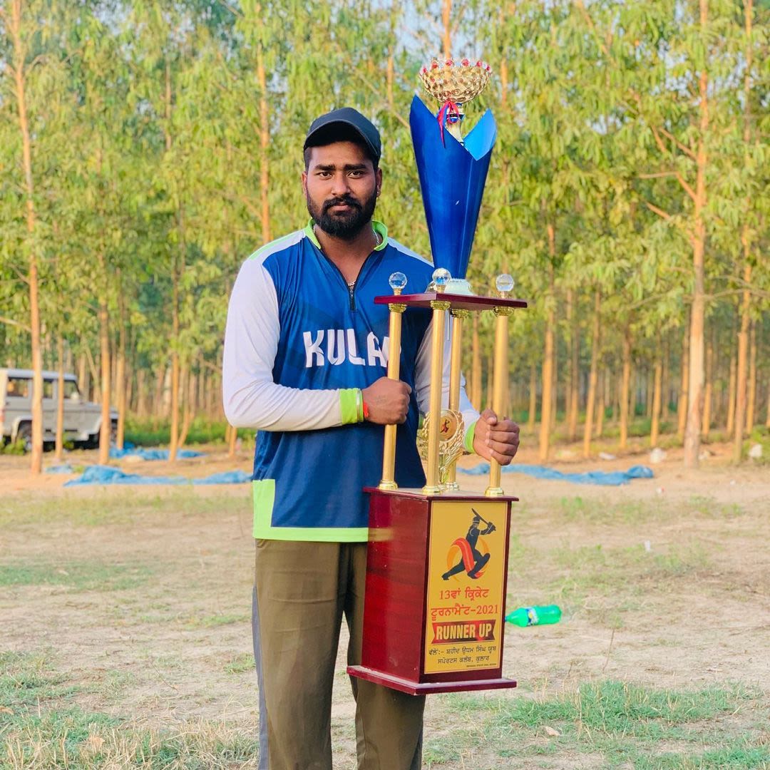 Ramesh Kumar poses with the trophy