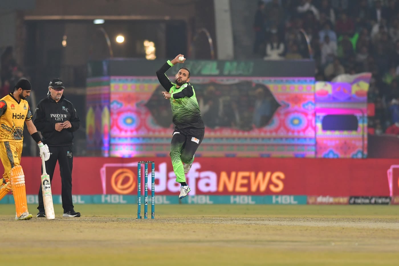 Fawad Ahmed in his delivery stride
