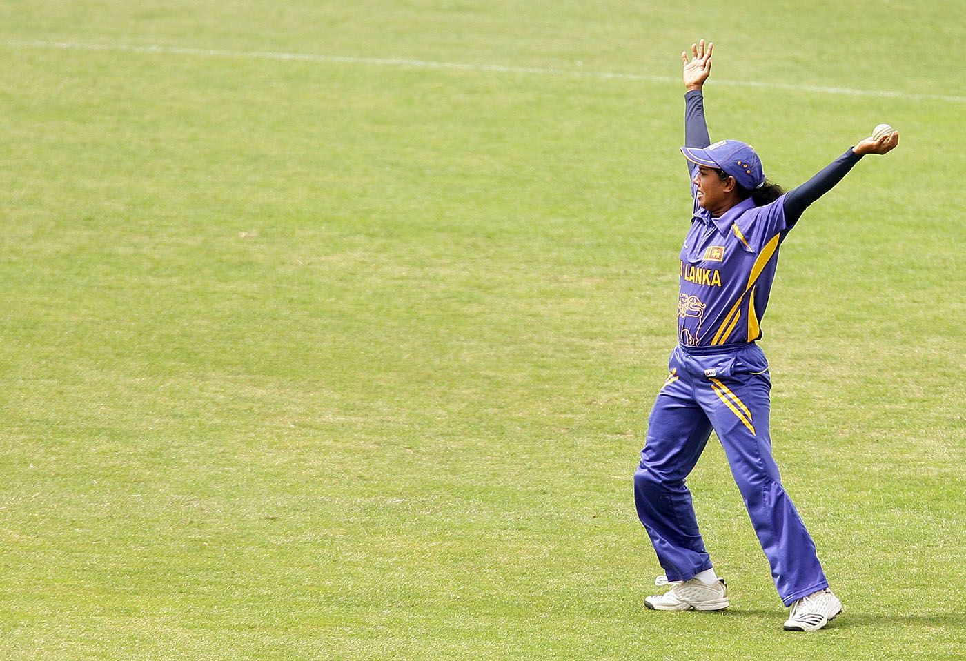 Hiruka Fernando celebrates after taking a catch