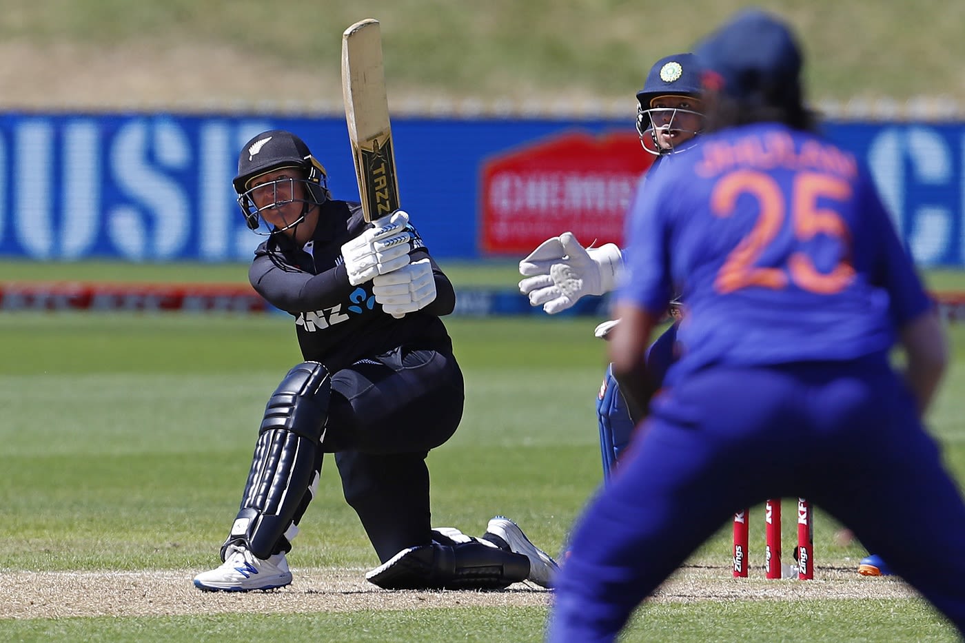 Hayley Jensen slogs one over deep midwicket