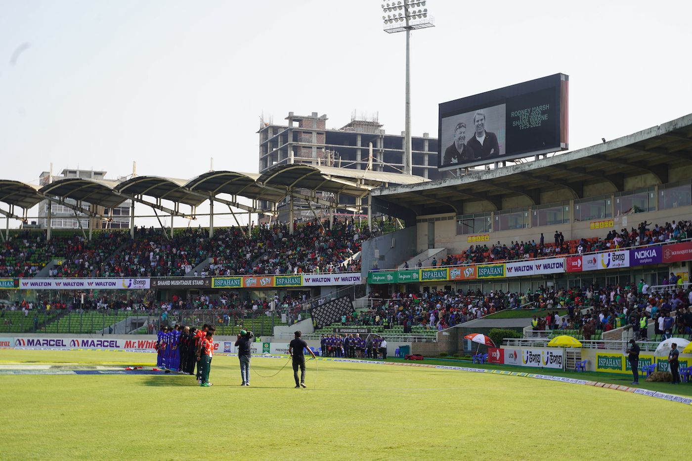 The Bangladesh and Afghanistan players pay their tributes to Rodney Marsh and Shane Warne