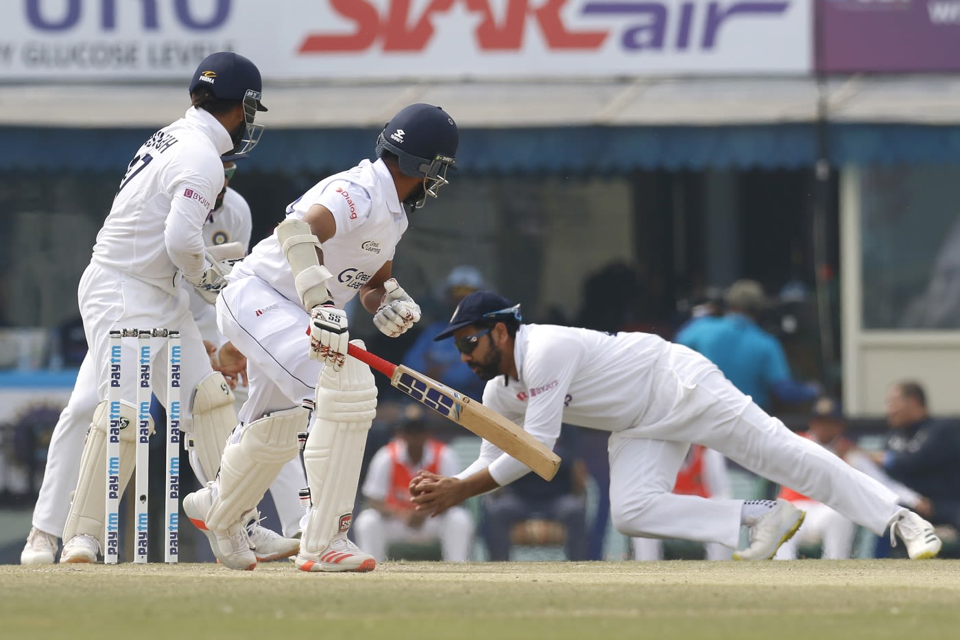 Rohit Sharma dives to catch Lahiru Thirimanne's edge