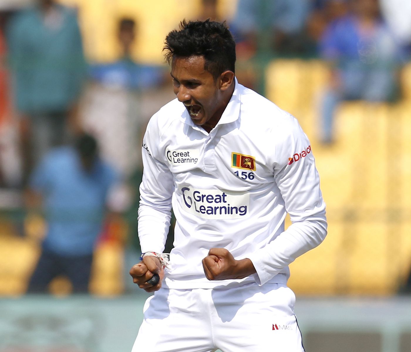 Praveen Jayawickrama is pumped after getting the wicket of Hanuma Vihari