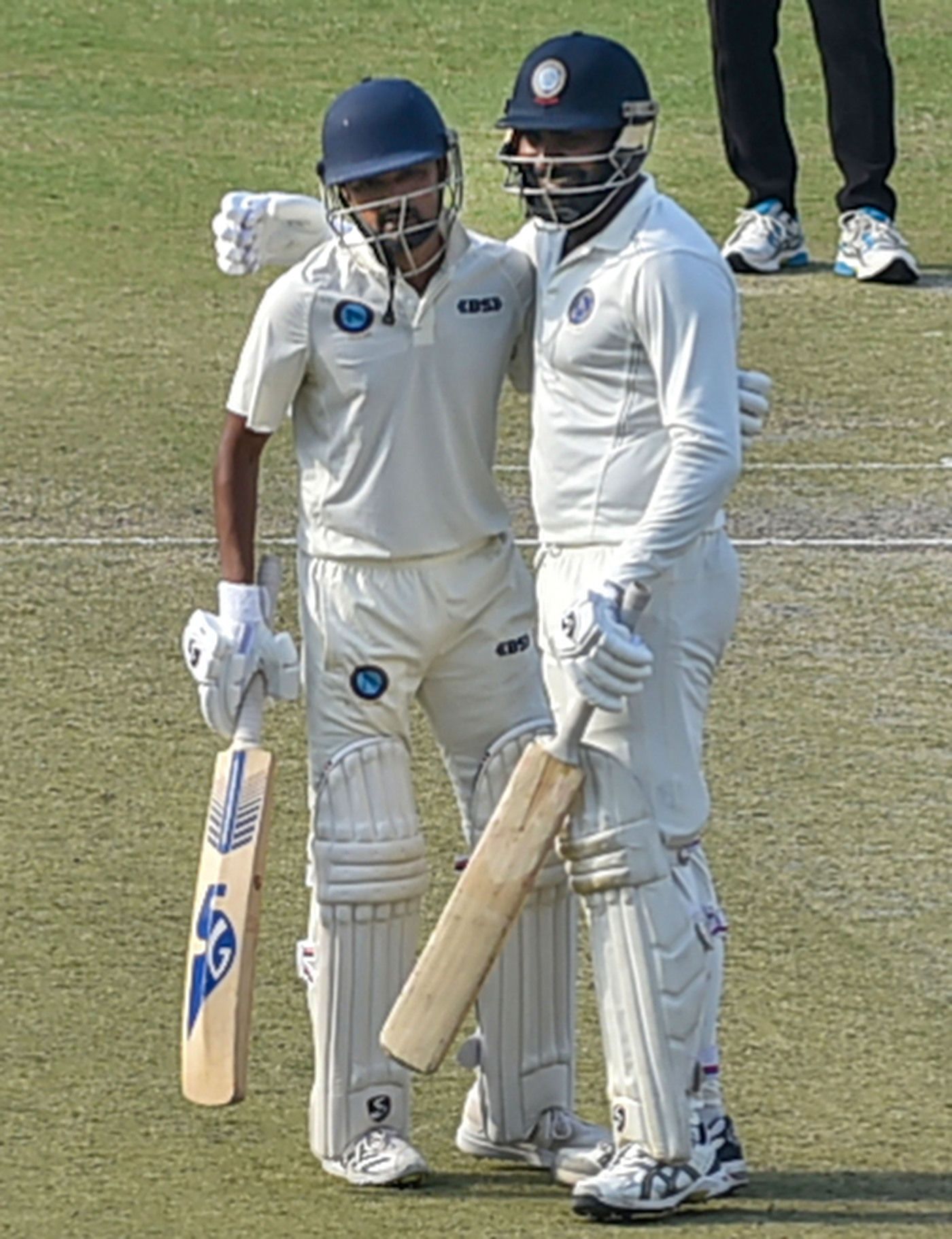 Rahul Shukla congratulates Shahbaz Nadeem after the latter brought up his century