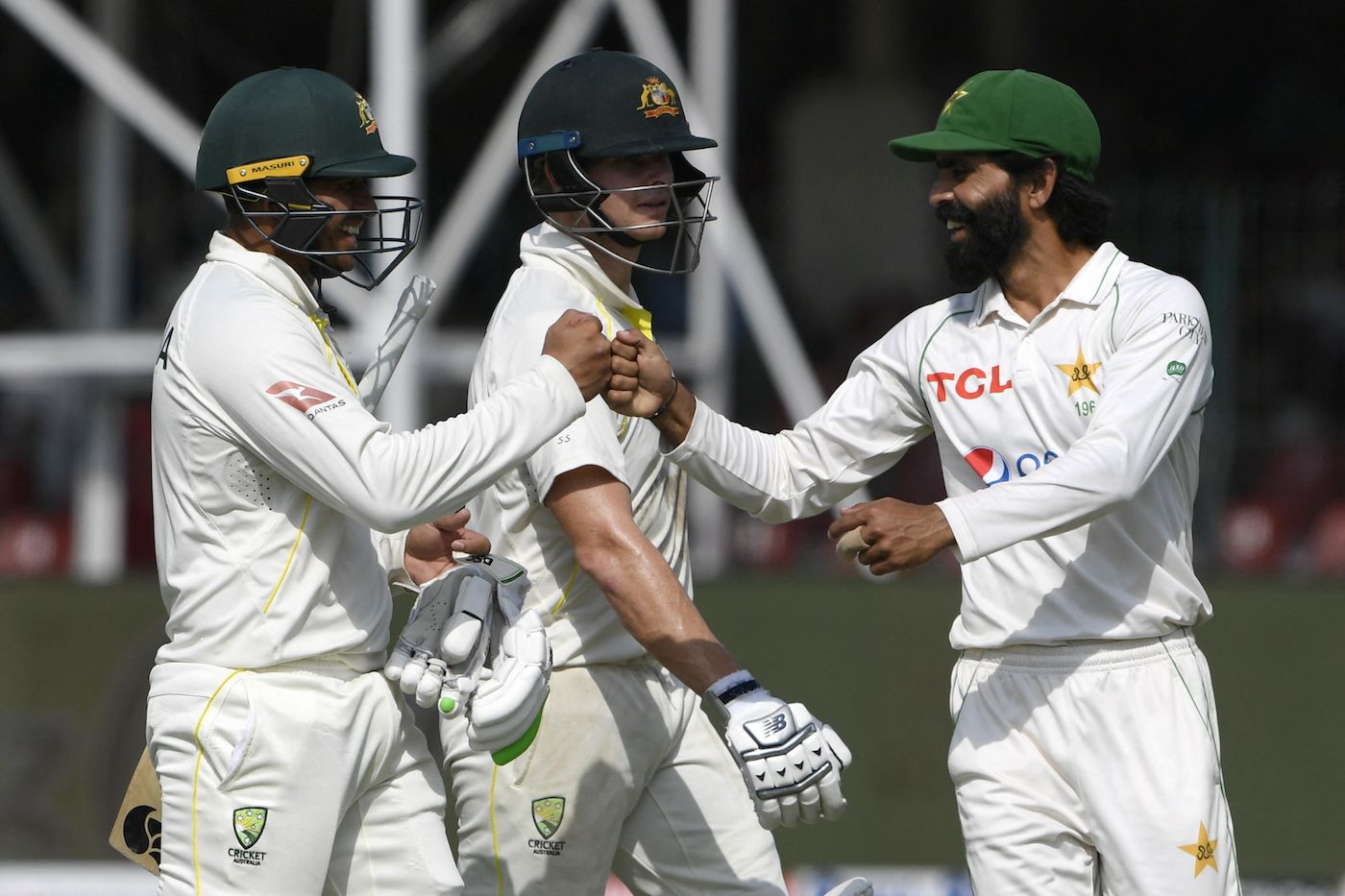 Fawad Alam congratulates Usman Khawaja for his century