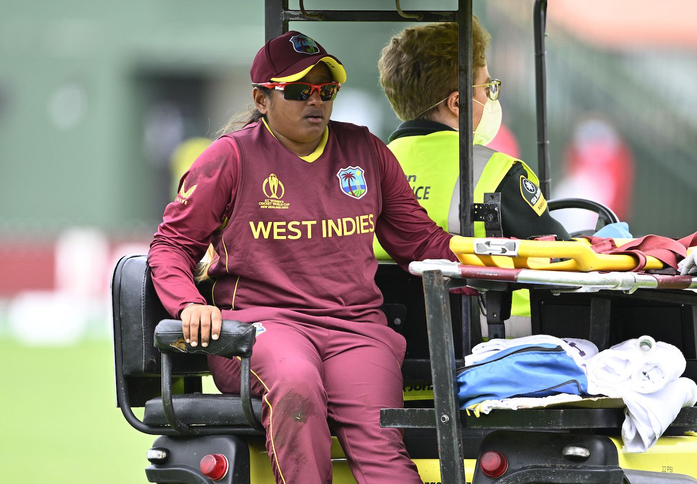 Anisa Mohammed is taken off in a cart after hurting her hamstring