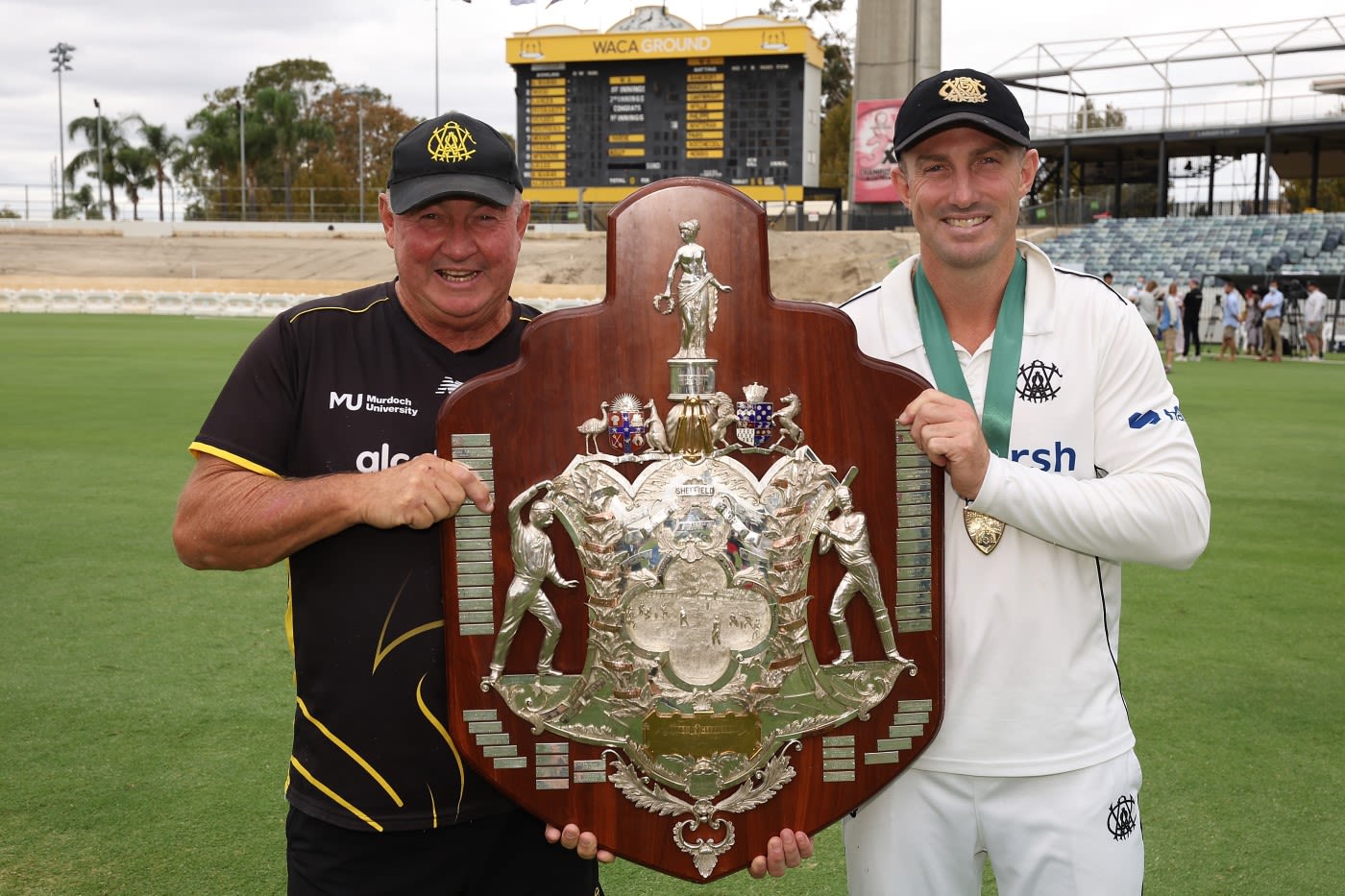 Father and son - Shaun Marsh and Geoff Marsh pose with the Sheffield Shield title