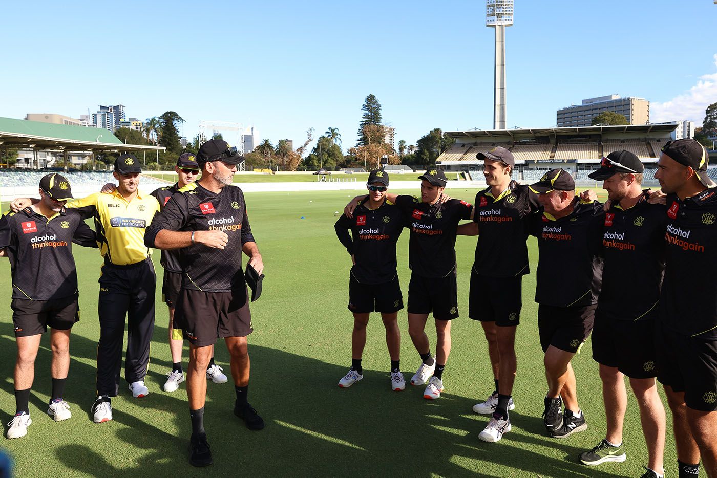 Matt Mason presents Lance Morris with his Western Australia cap