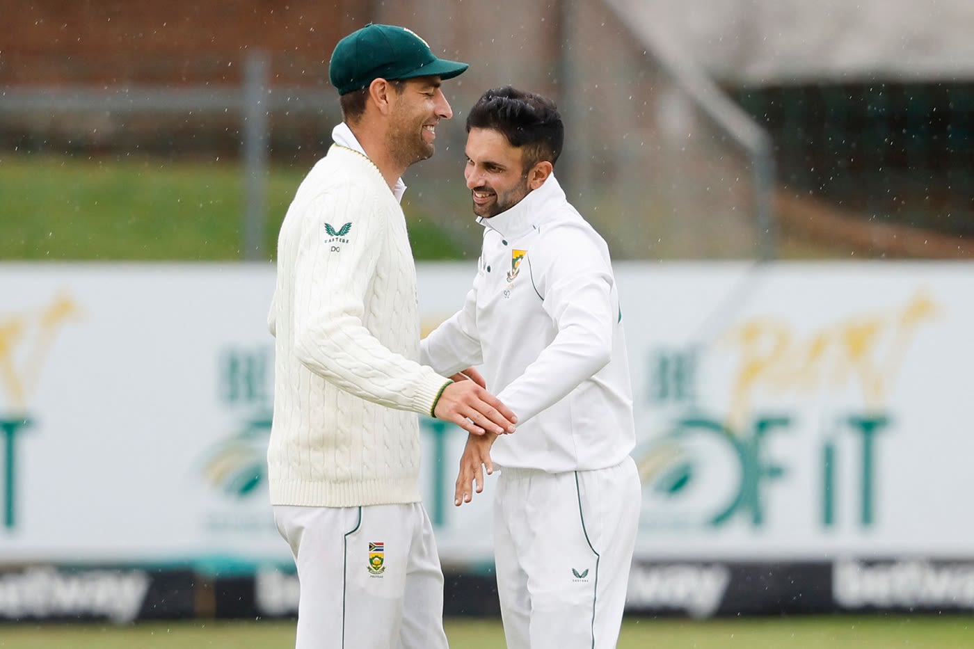 Keshav Maharaj and Duanne Olivier celebrate the wicket of Mehidy Hasan Miraz