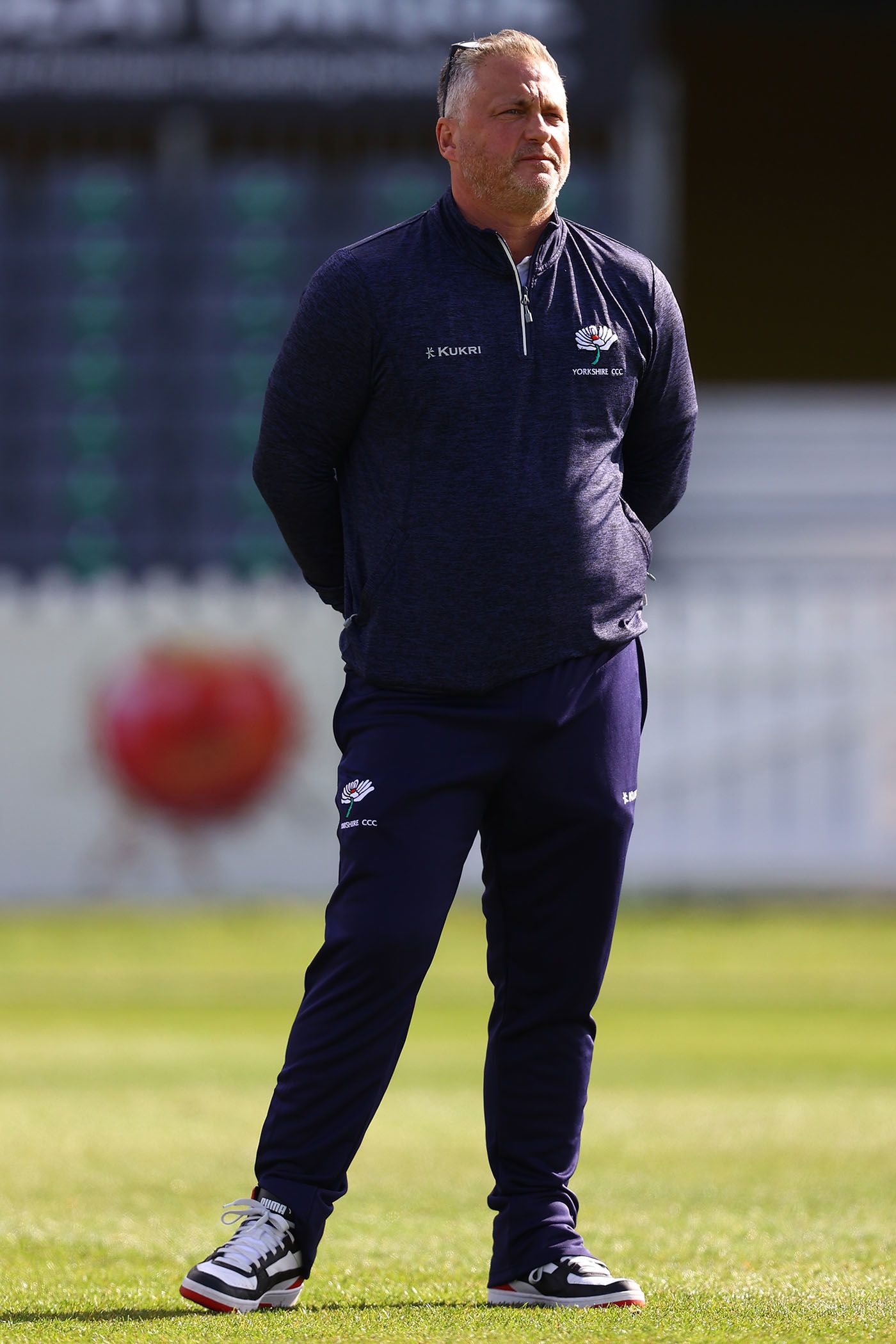 Darren Gough, Yorkshire's interim managing director of cricket, watches players warm up in Bristol