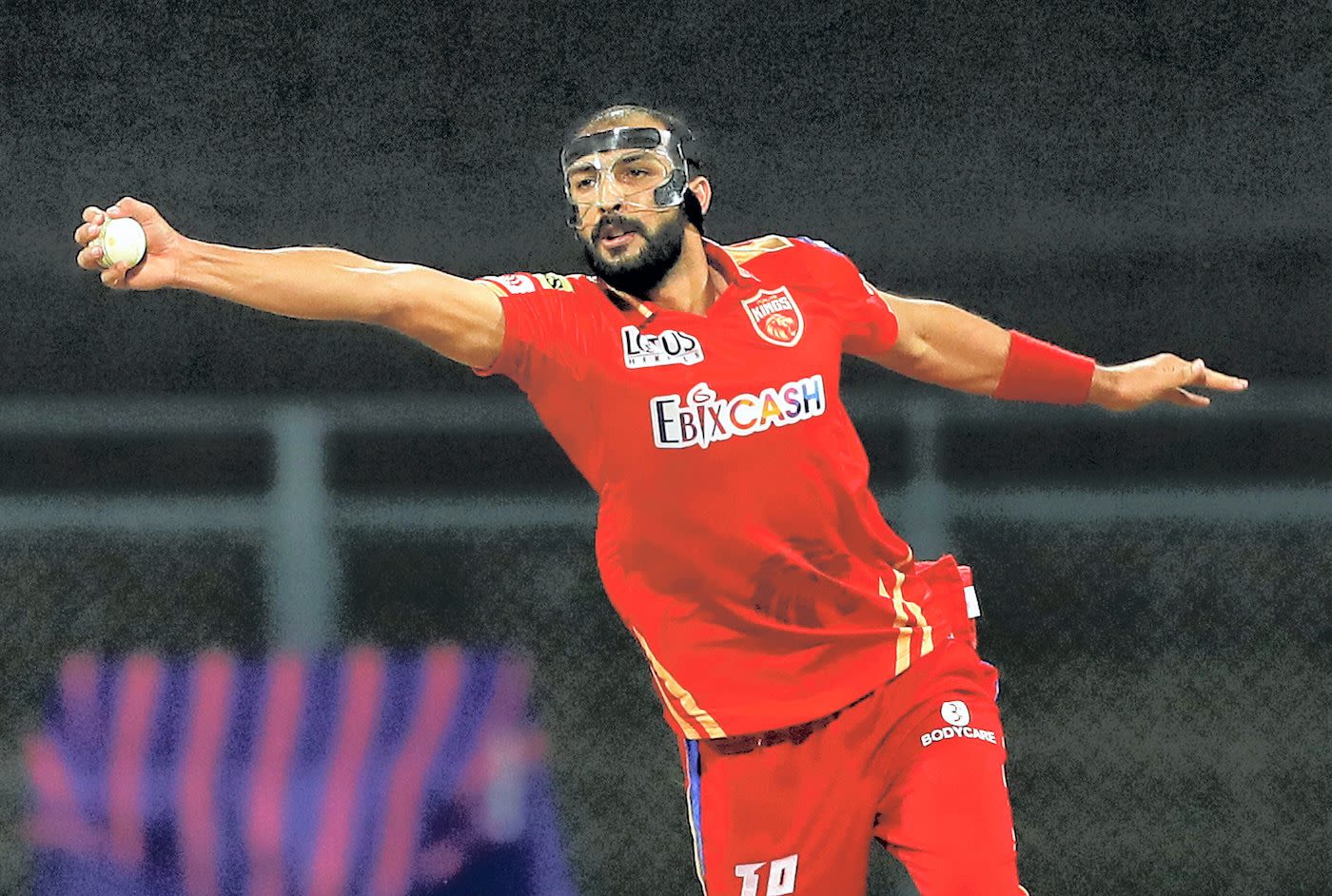 Punjab Kings Masked Marauder, Rishi Dhawan, fields the ball off his own bowling in the final over