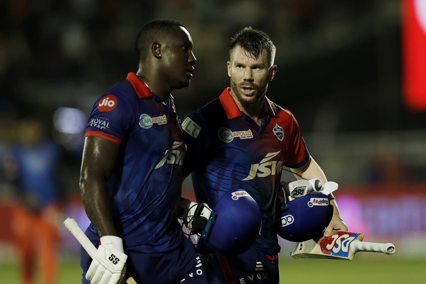Delhi Capitals' head coach Ricky Ponting and assistant coaches Pravin Amre, Ajit Agarkar and Shane Watson watch the game