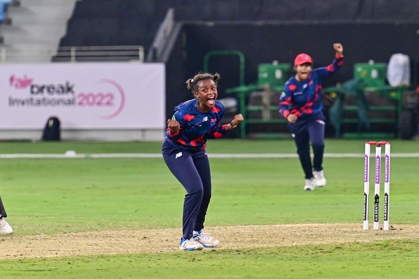 Henriette Ishimwe celebrates a wicket