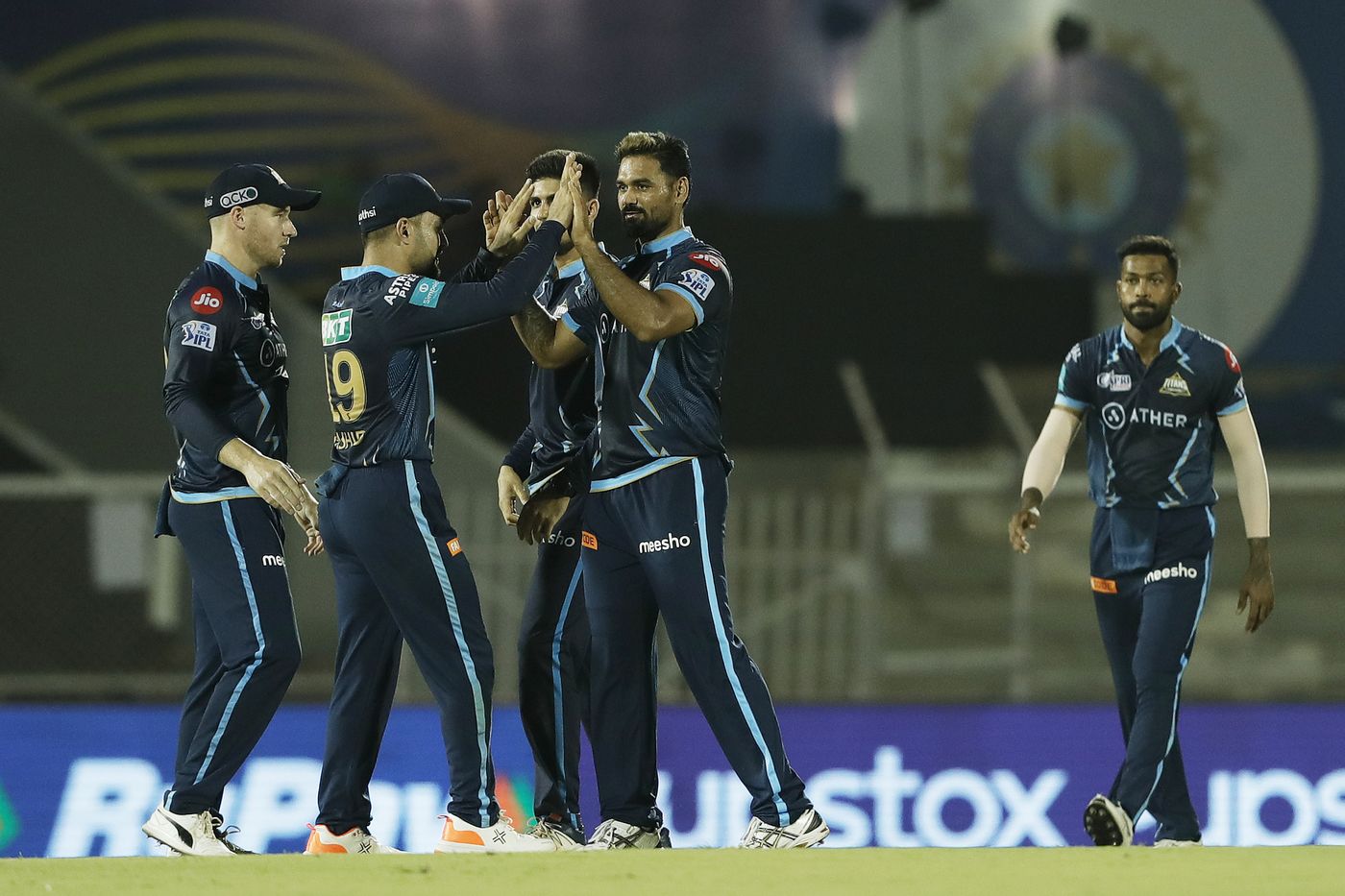 Pradeep Sangwan celebrates the wicket of Suryakumar Yadav with team-mates