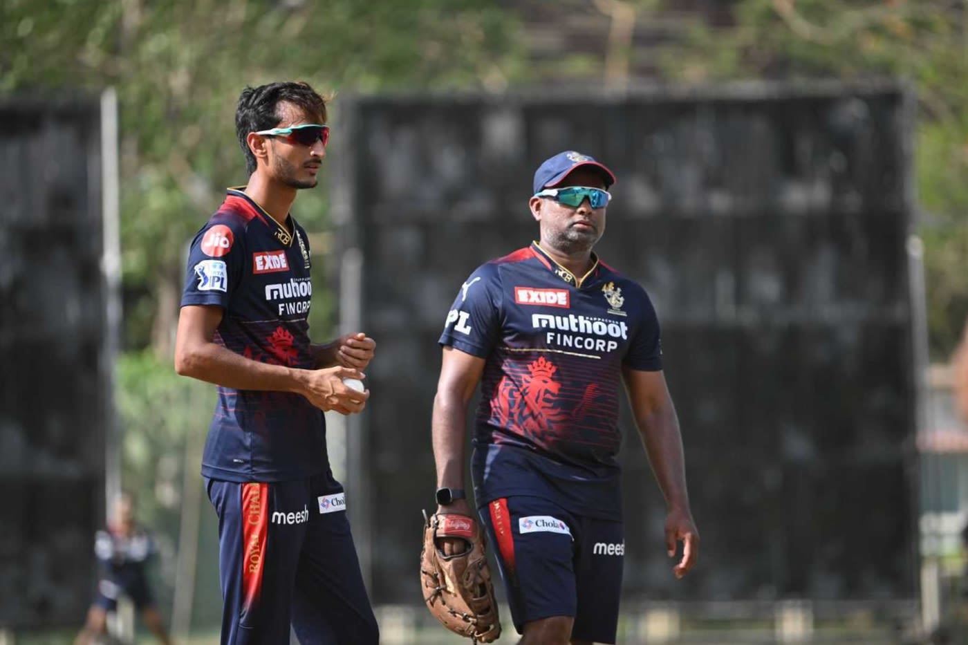 Shahbaz Ahmed and RCB spin bowling coach S Sriram practise in the nets
