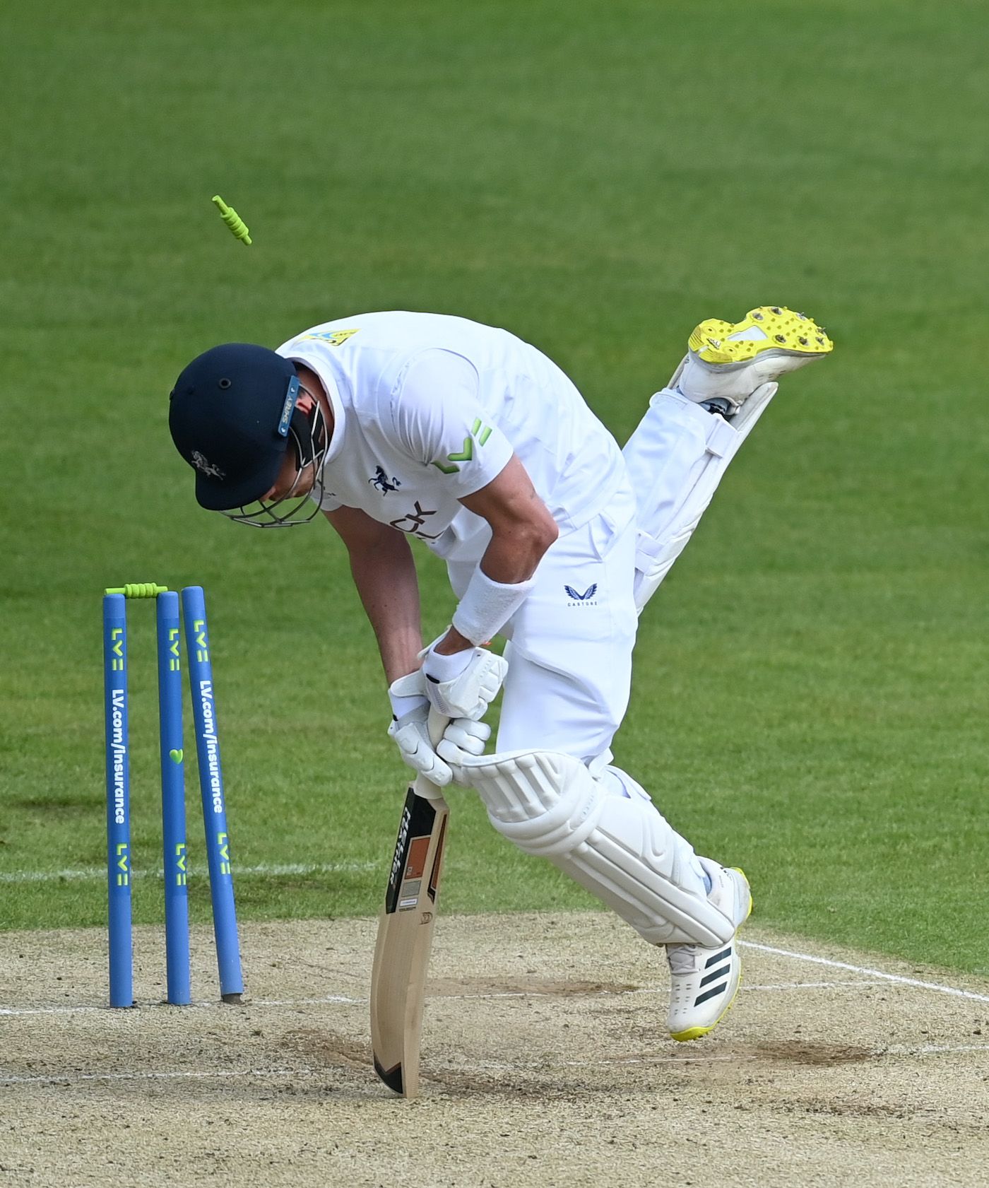 Nathan Gilchrist is bowled by Haris Rauf
