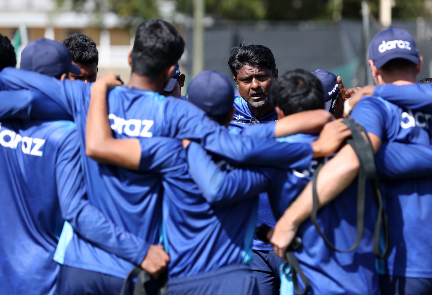 Naveed Nawaz, head Coach of Bangladesh, interacts with the players during a nets session