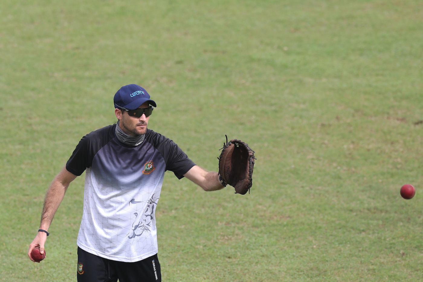 Bangladesh fielding consultant Ryan Cook in action during a practice session