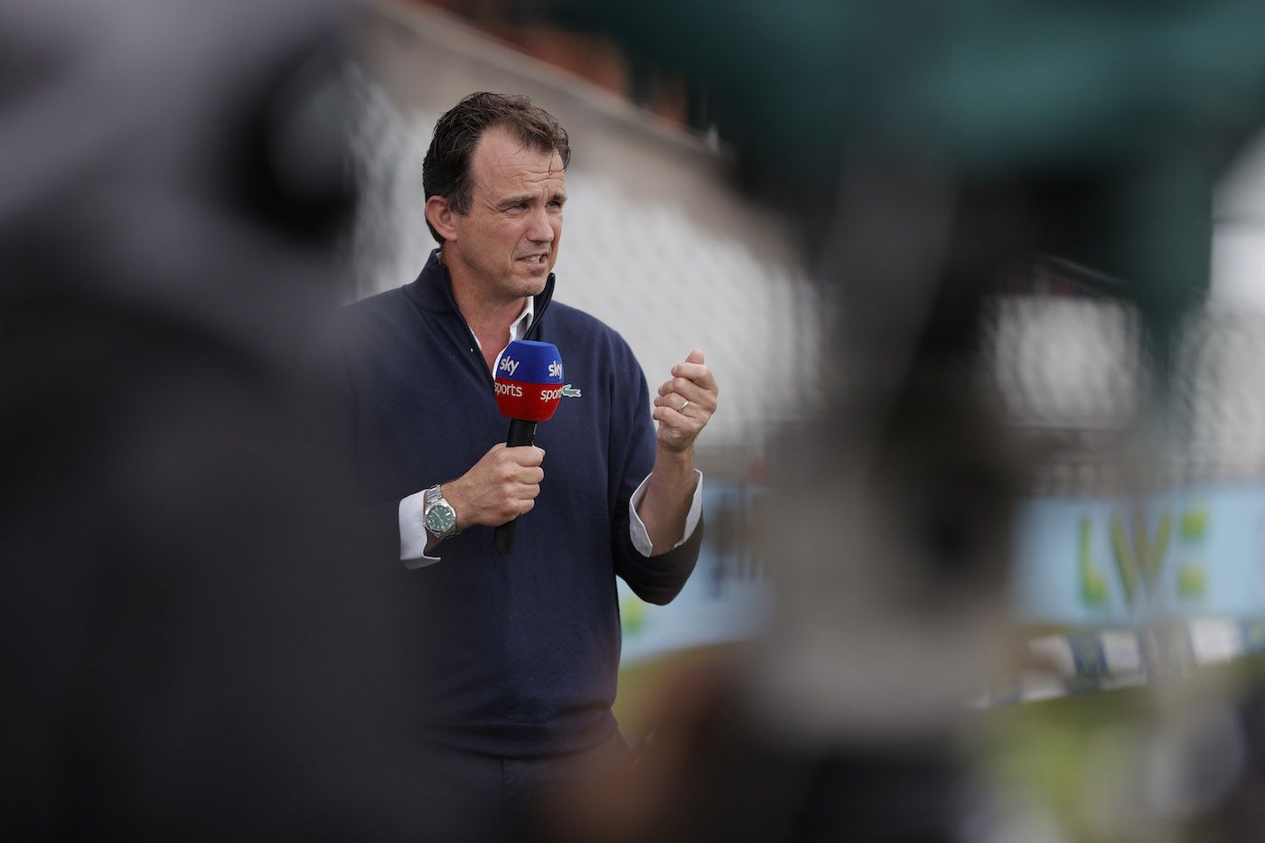 Tom Harrison speaks to the press