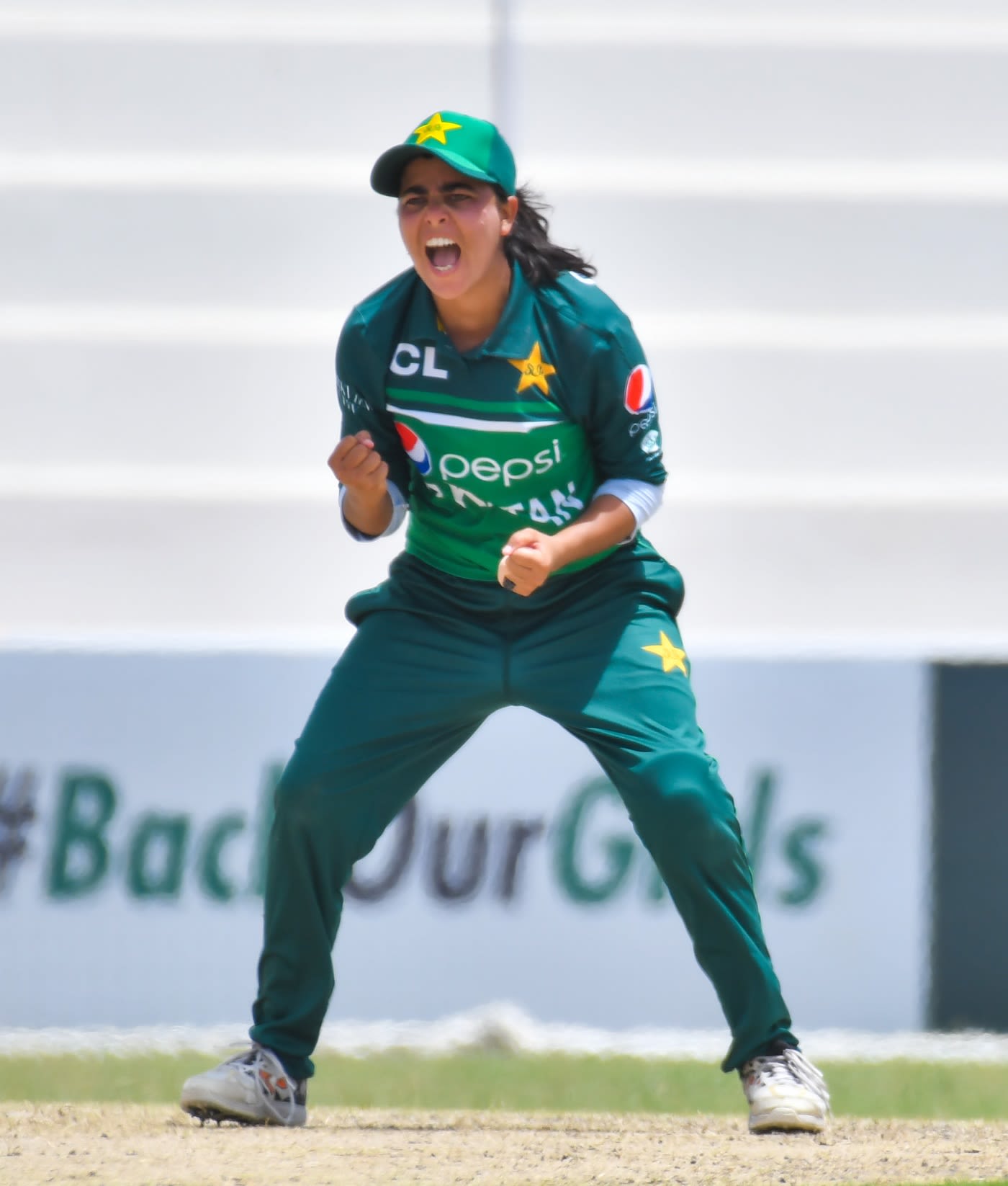 Ghulam Fatima roars after taking a wicket