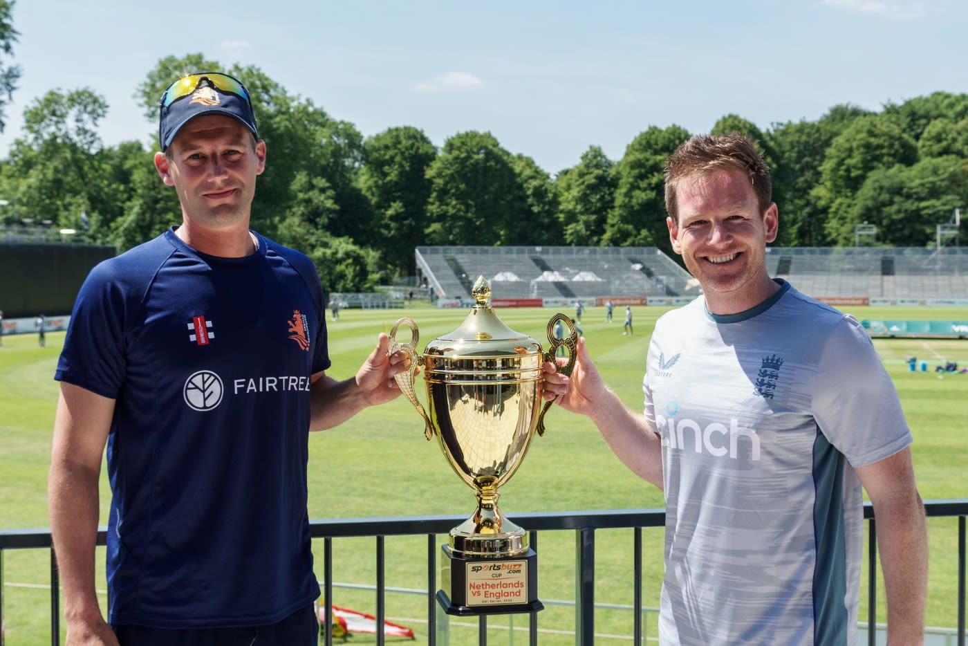 Pieter Seelaar and Eoin Morgan pose with the series trophy
