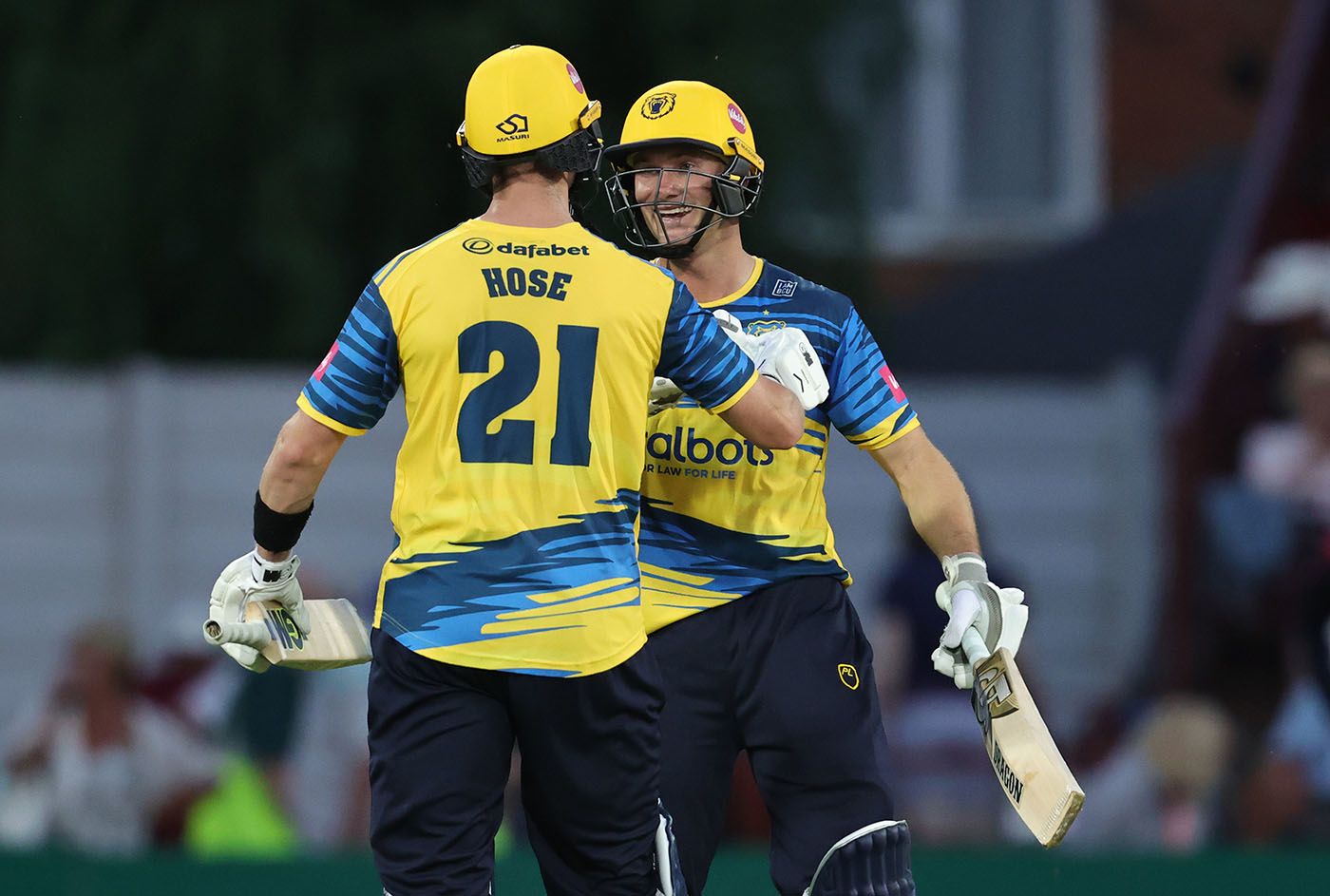 Adam Hose and Chris Benjamin celebrate victory