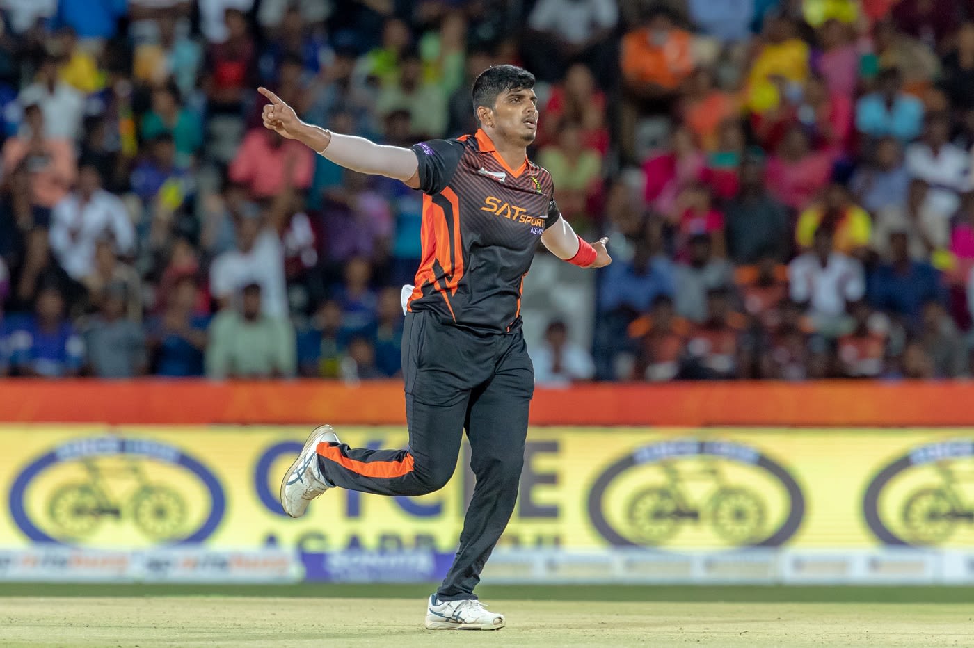 Ajay Krishna celebrates a wicket