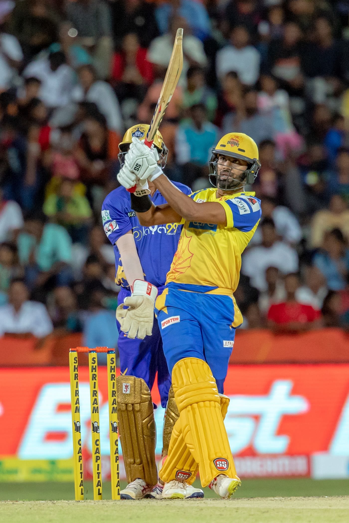 C Hari Nishaanth launches a six over the leg side