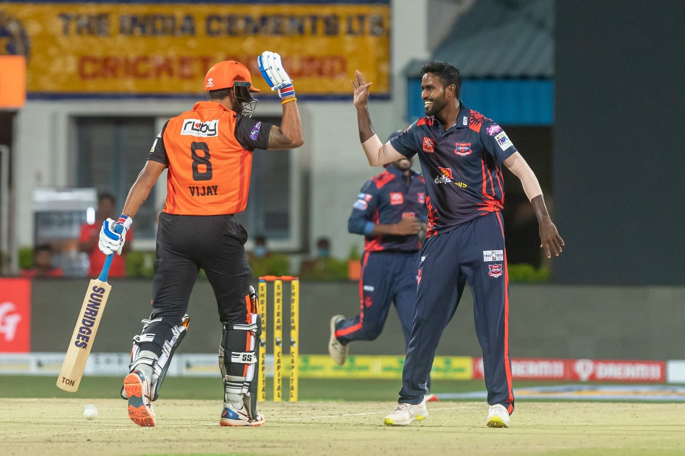 M Mohammed and M Vijay share a lighter moment