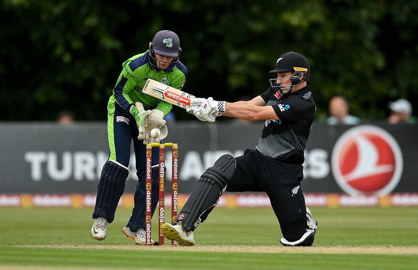 Dane Cleaver attempts a reverse sweep during his highest T20I score