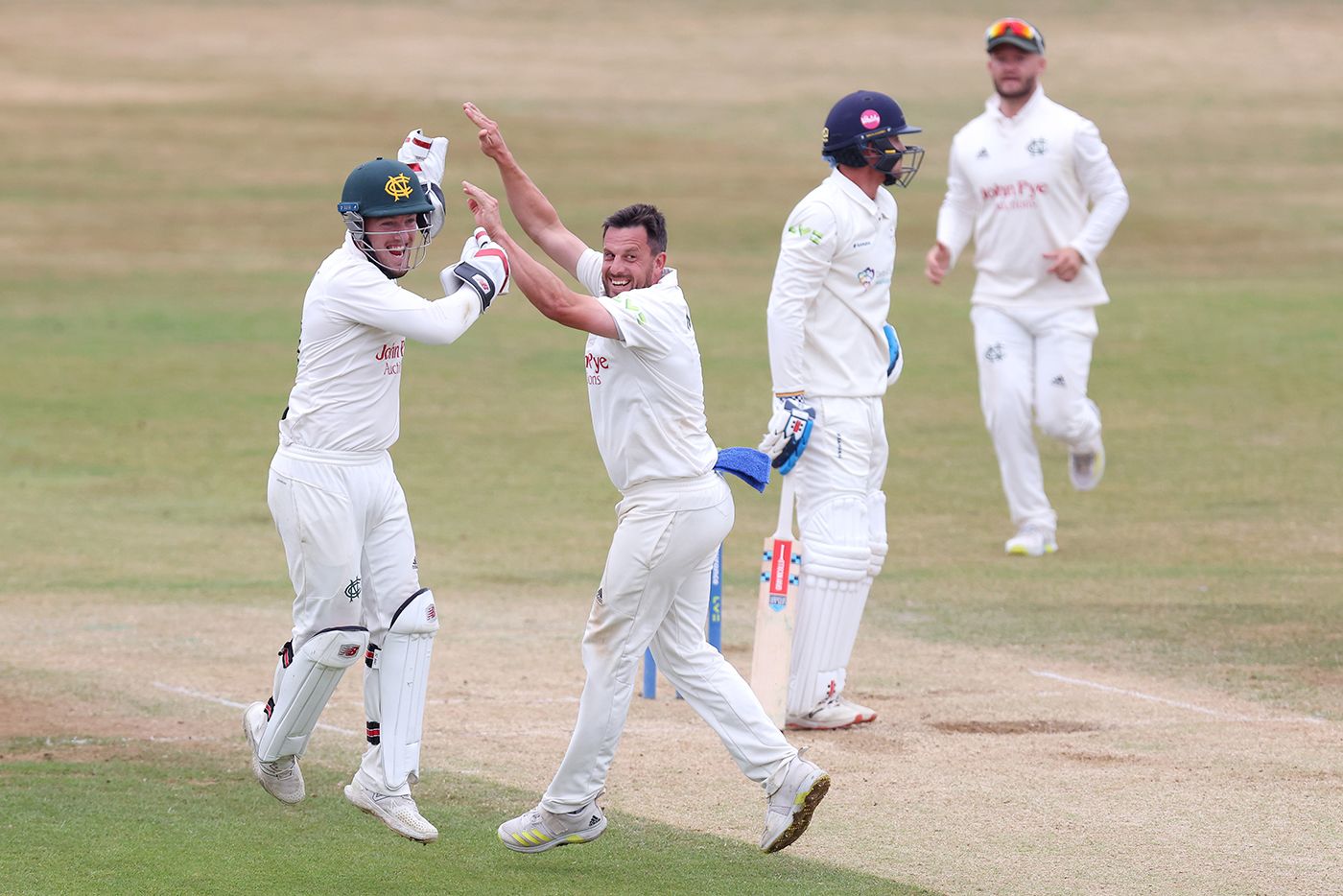 Tom Moores and Steven Mullaney celebrate removing Leus du Plooy