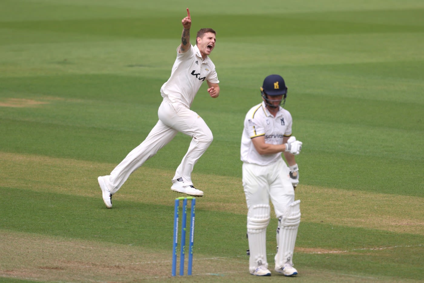 Conor McKerr claims the wicket of Chris Benjamin