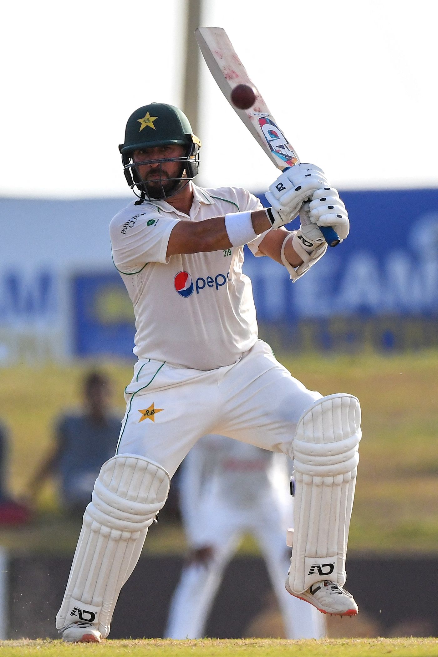 Yasir Shah punches the balls towards the covers