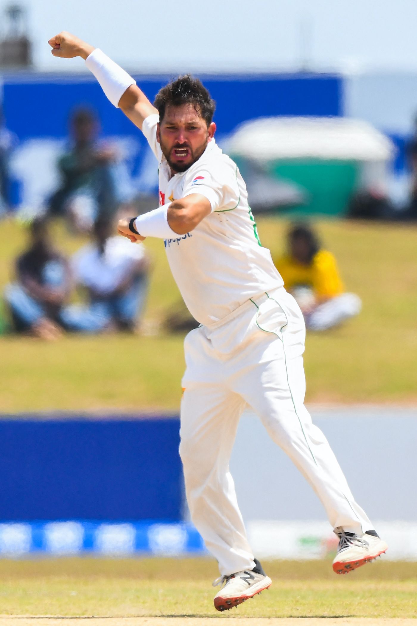 A jubilant Yasir Shah celebrates after removing Oshada Fernando with his first ball