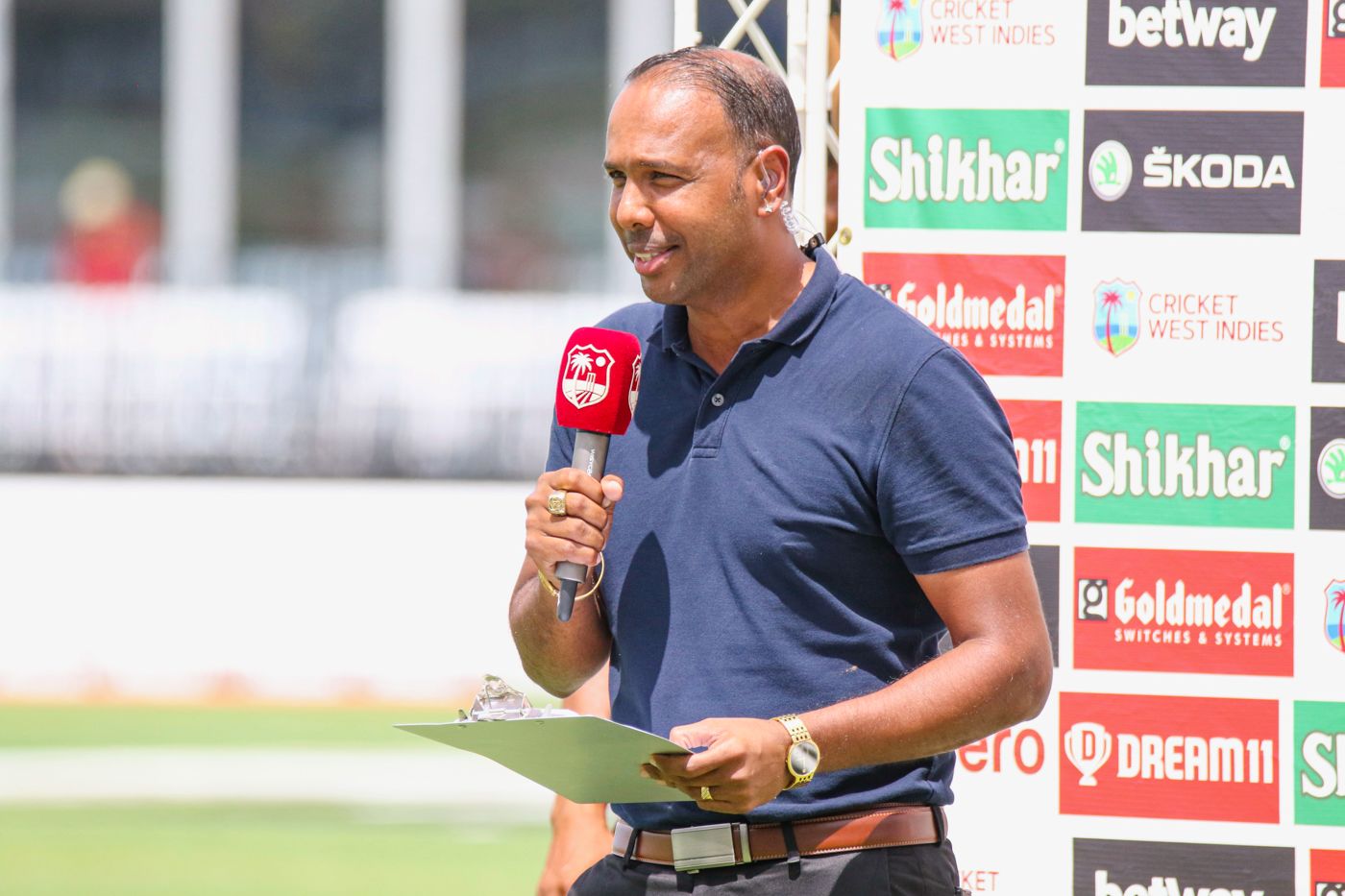 Samuel Badree conducts the post-match presentation