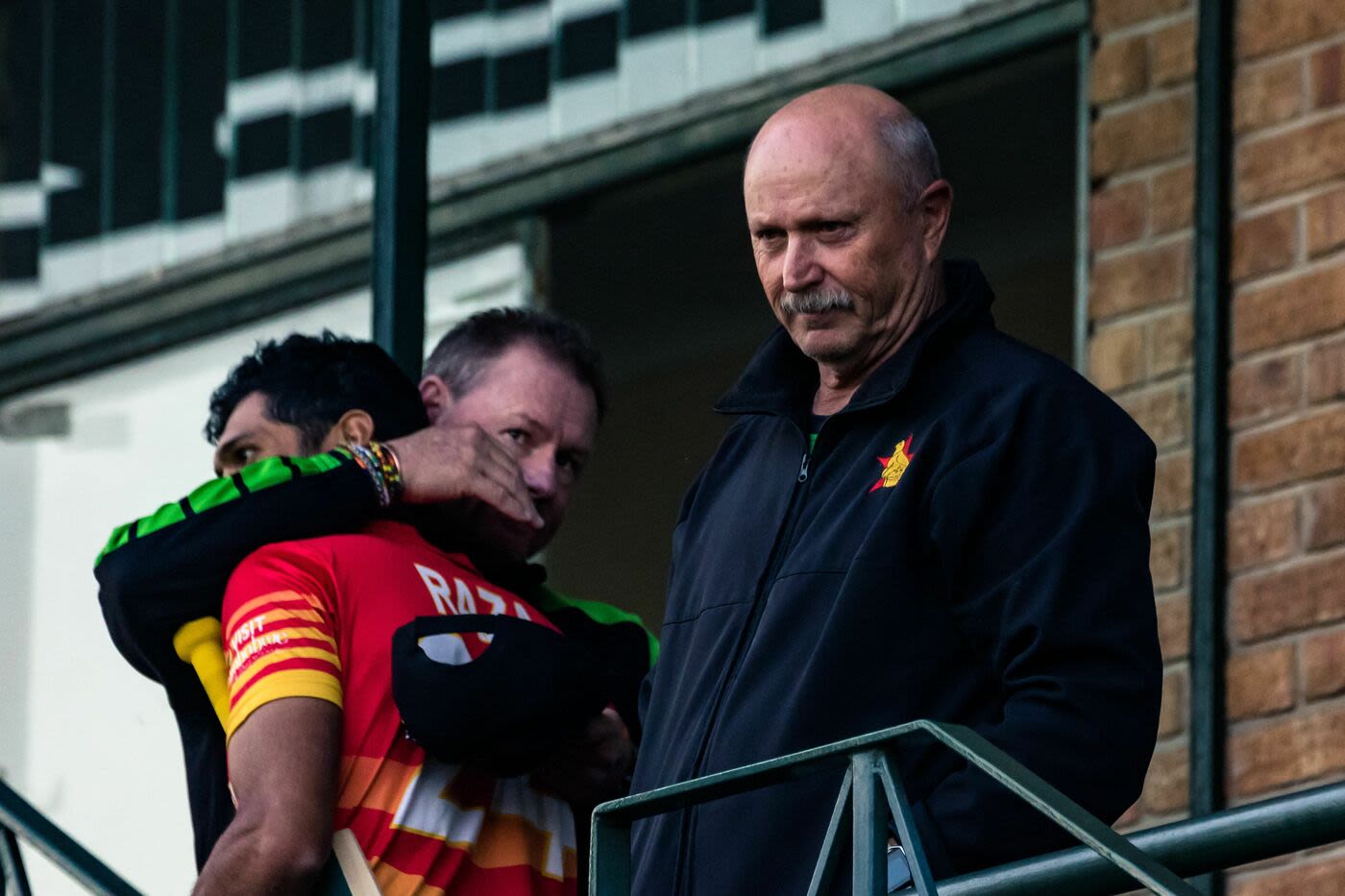 Zimbabwe head coach Dave Houghton watches proceedings after his team's series-sealing chase