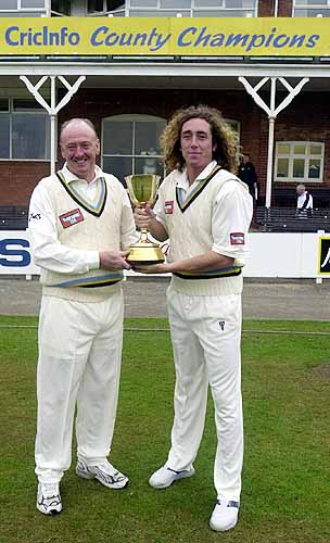 Arnie and Ryan Sidebottom celebrating the CricInfo Championship success