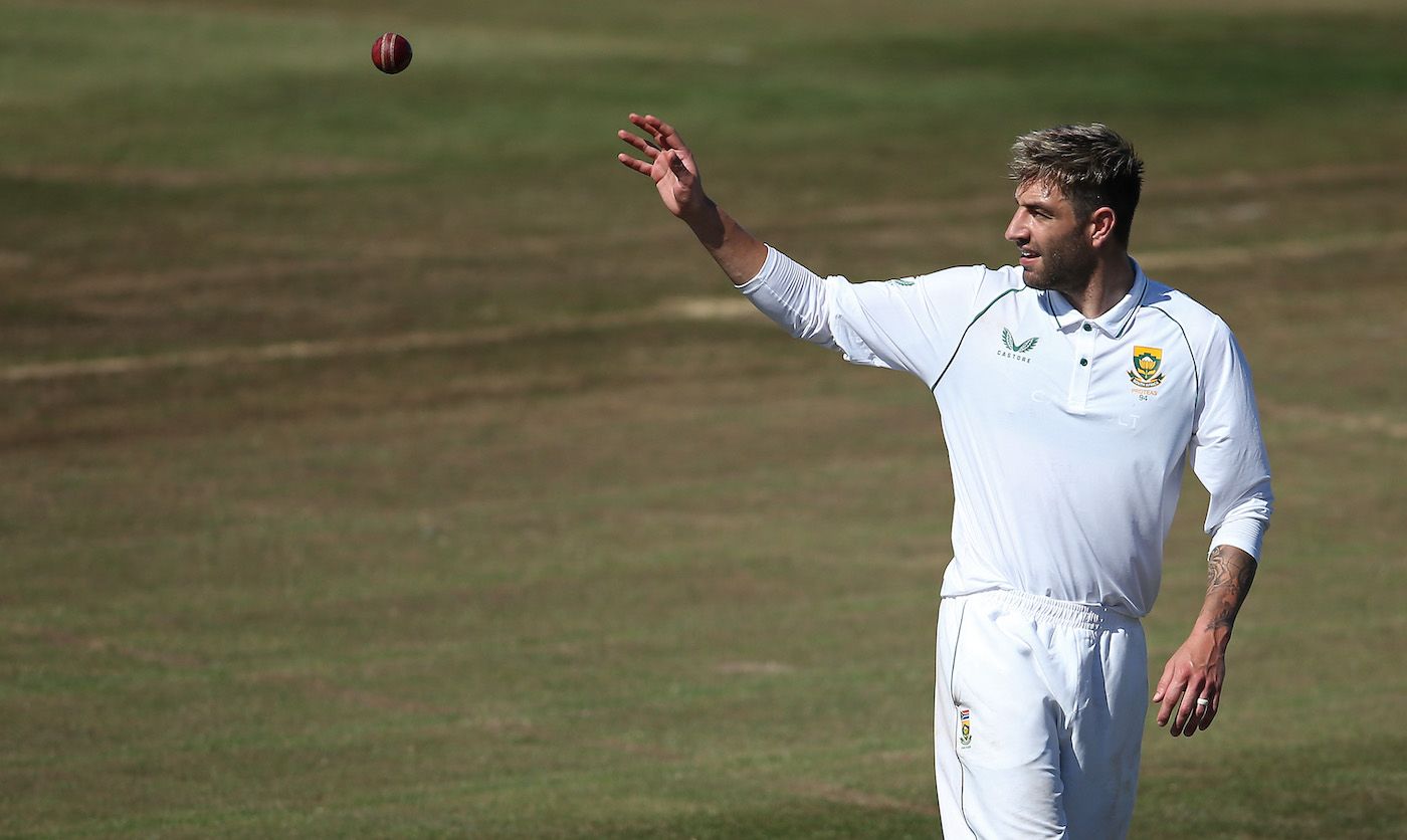 Duanne Olivier bowls during the match against England Lions