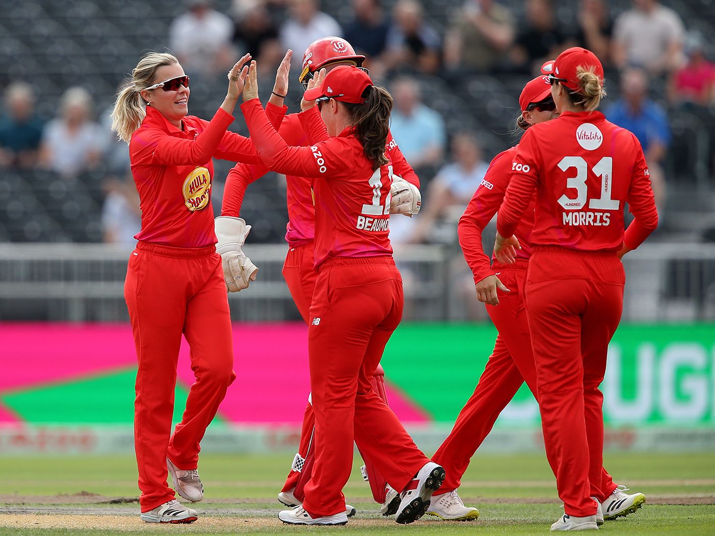 Alex Hartley celebrates with her team-mates