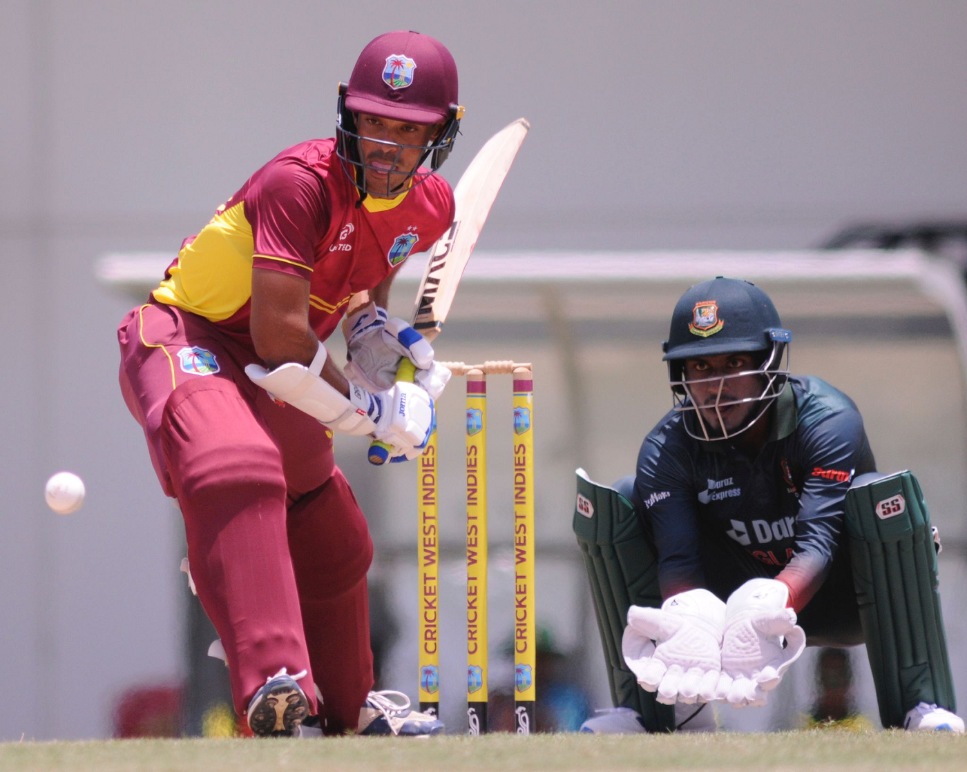 Tagenarine Chanderpaul gets ready to face a ball as wicketkeeper Jaker Ali looks on