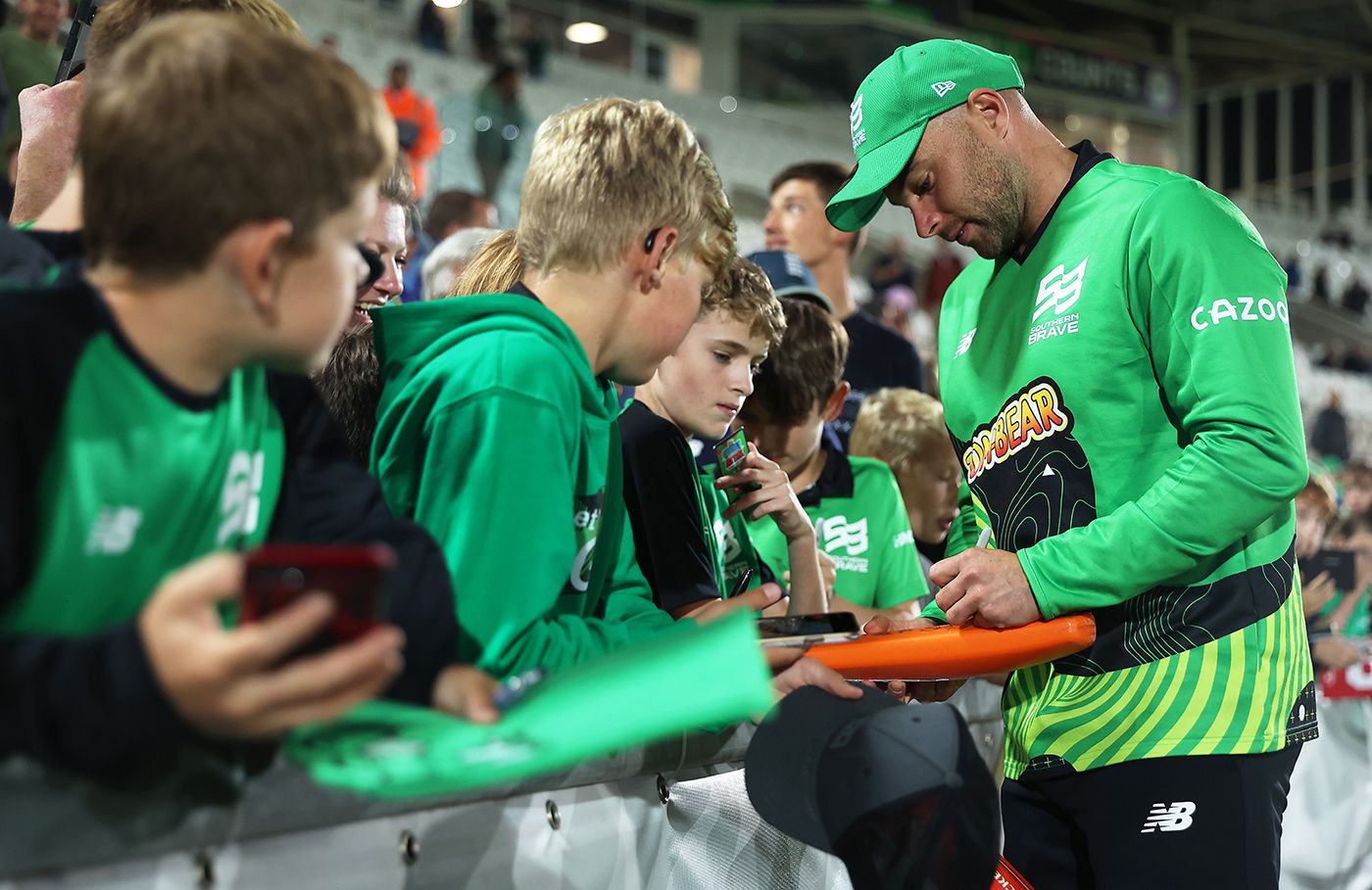 Jake Lintott signs autographs at the Ageas Bowl