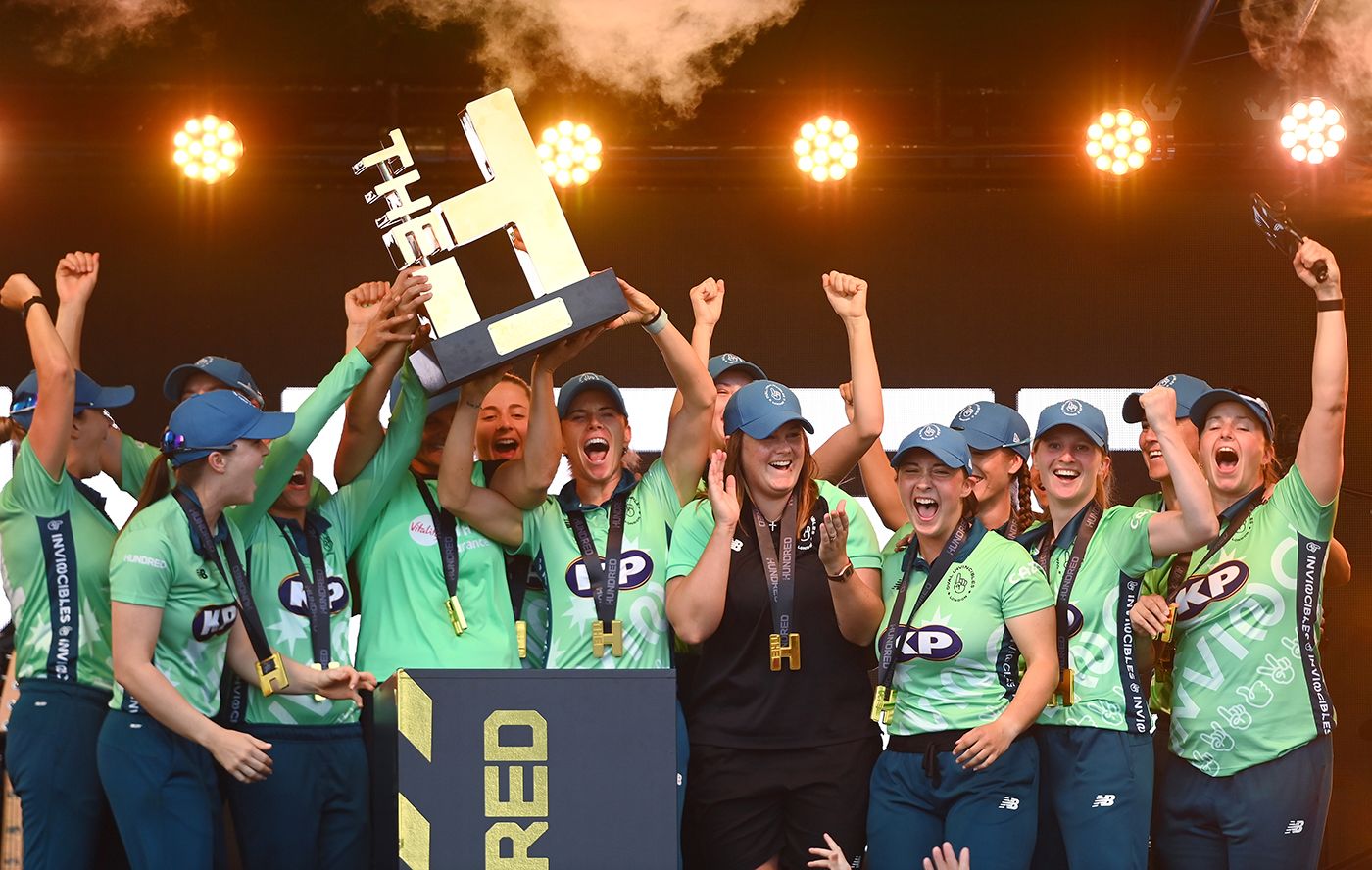 Oval Invincibles celebrate with the Hundred trophy