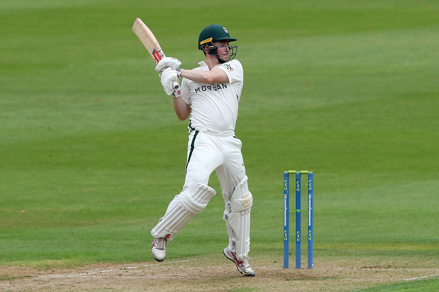 Ed Pollock piles into a cut shot