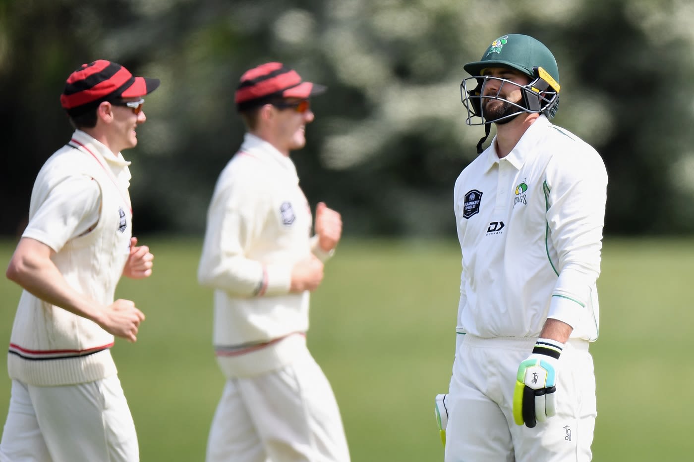 A dejected Tom Bruce walks back after being dismissed