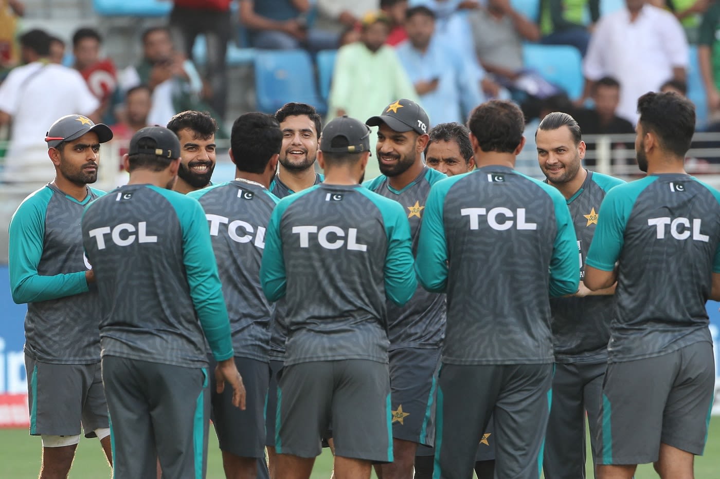 The Pakistan players are all smiles in the huddle