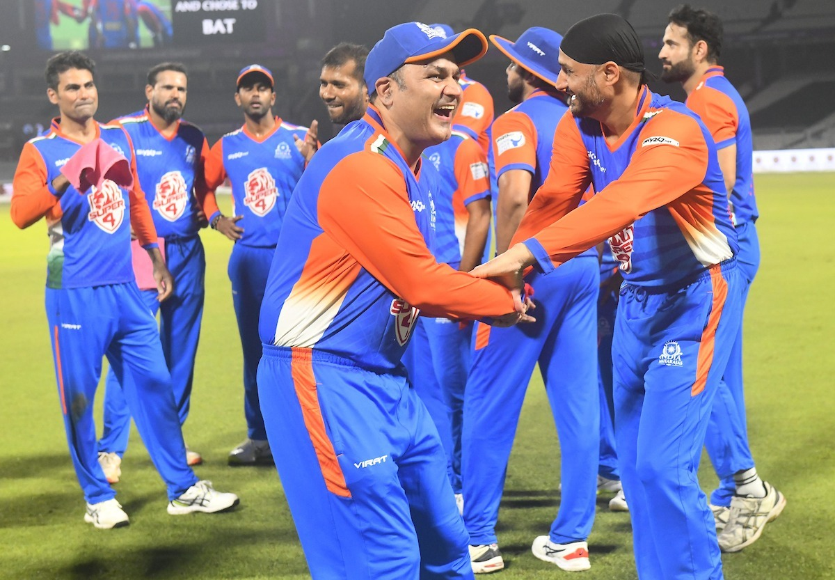 Virender Sehwag and Harbhajan Singh share a light moment