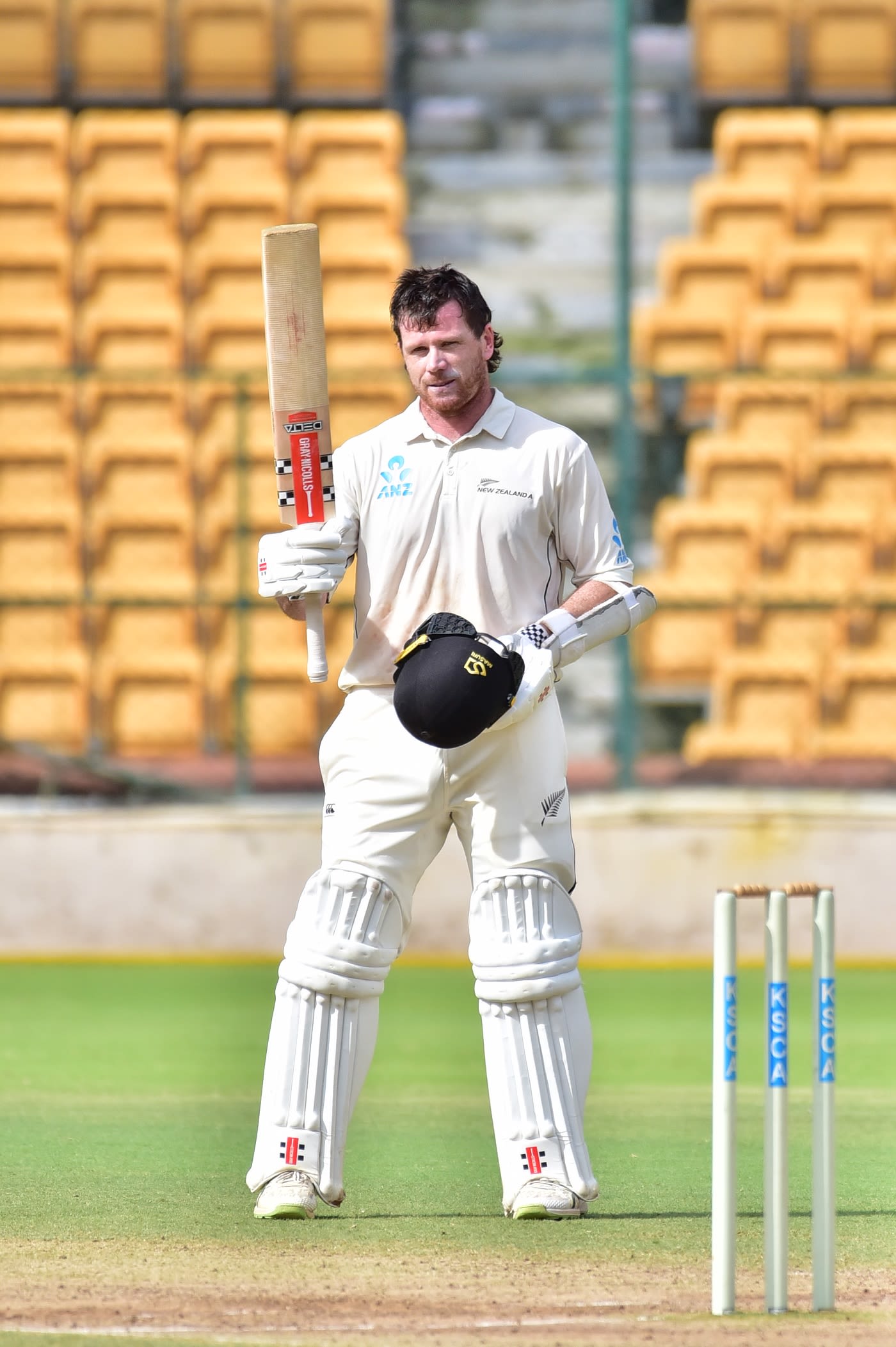 Joe Carter celebrates his hundred